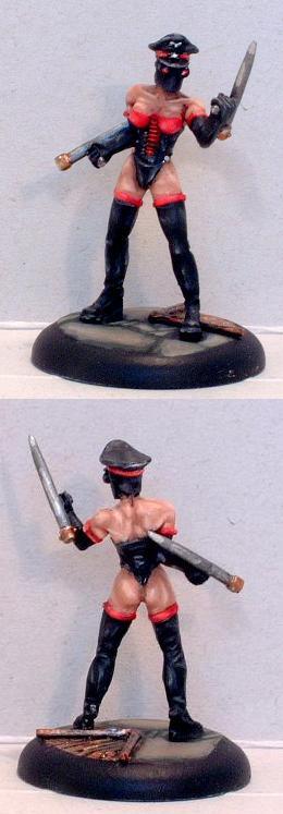 Front and back views of a painted female warrior miniature with sword and hat.