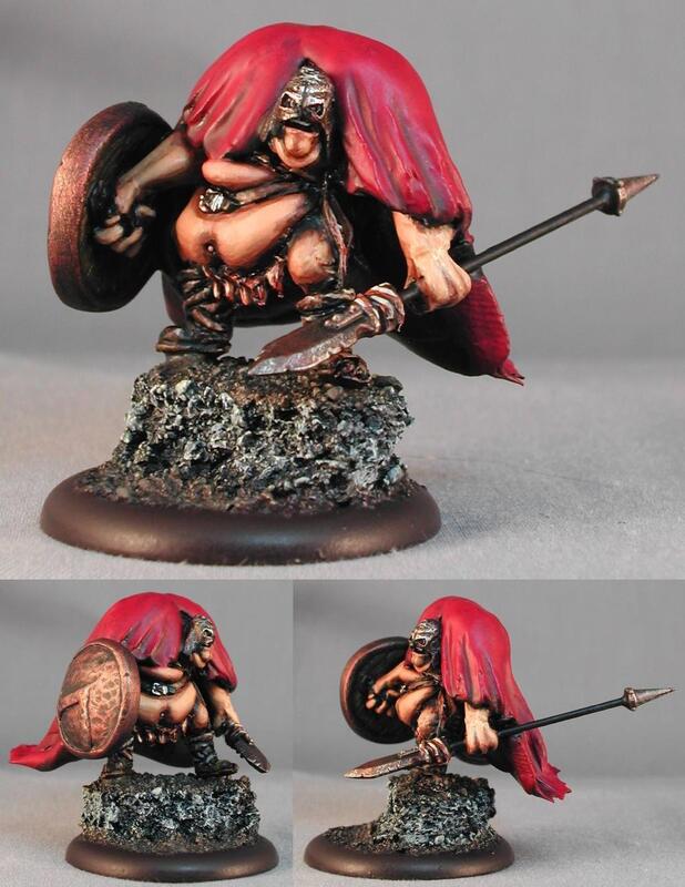 Painted fantasy warrior miniature with red hood, shield, and spear, shown from three angles