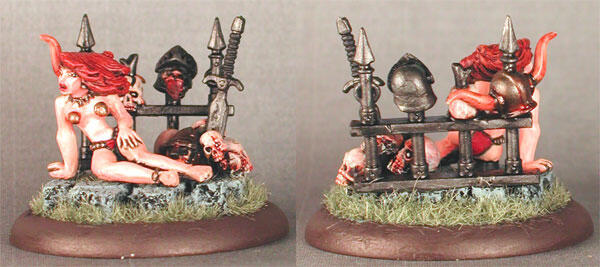 Front and back views of painted fantasy miniatures on a grassy oval base.